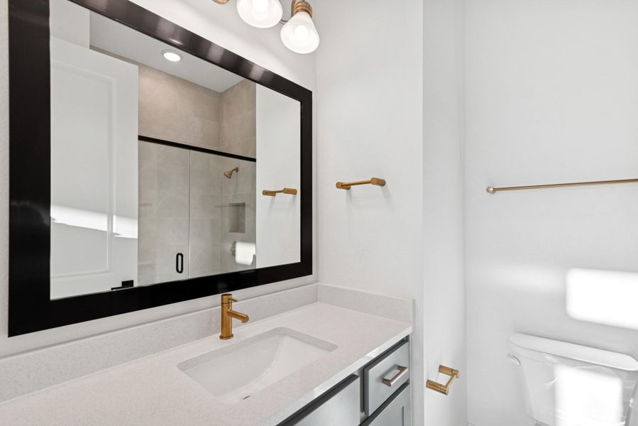 REPRESENTATIVE PHOTO: En suite bath with walk in shower