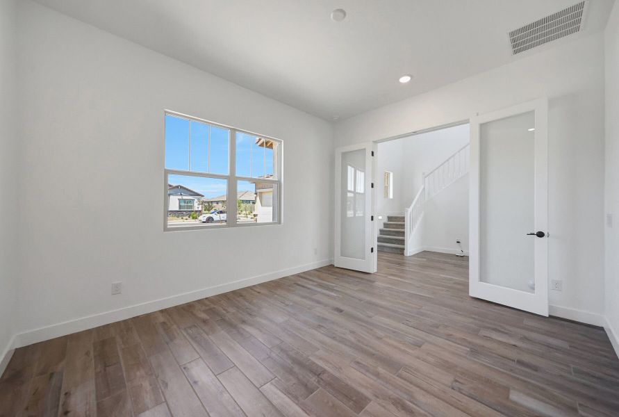 Spacious, unfurnished interior of a new home in Miravida, Surprise (Image 13).