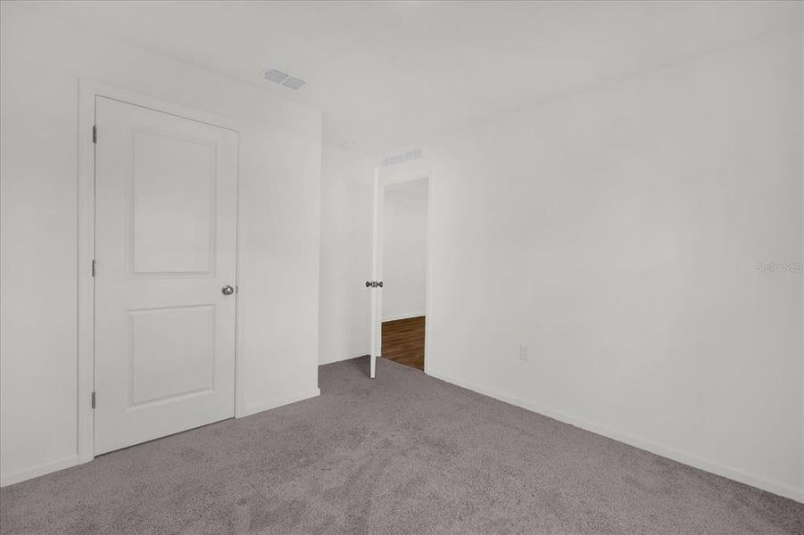 Spacious, unfurnished interior of a new home in Poinciana Village, Kissimmee (Image 27).