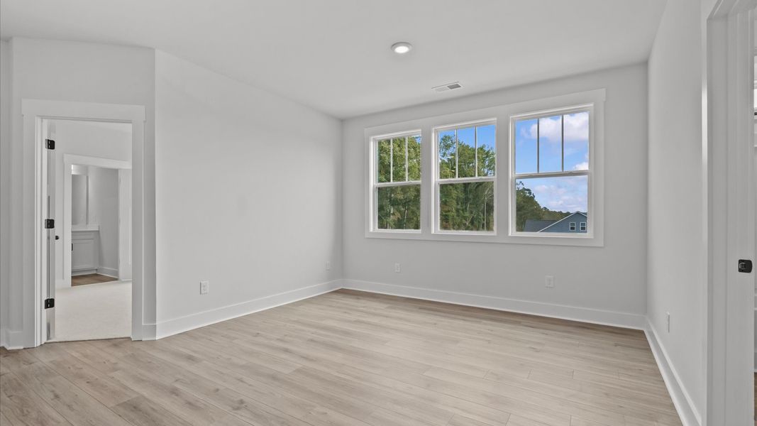 Top-notch design defines this loft with hardwood floors and an open, airy layout