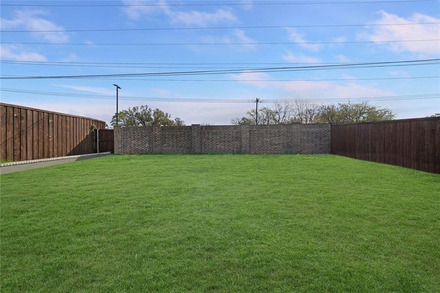 Exterior details and patio area of a home in , Garland (Image 3).