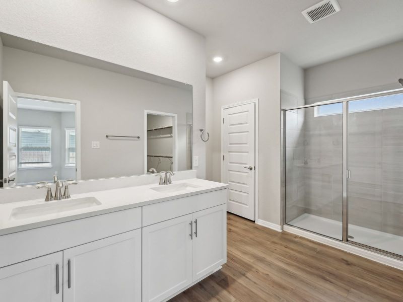 Furnished interior view inside a new home in Riverbend at Double Eagle - Boulevard Collection, Cedar Creek (Image 4).