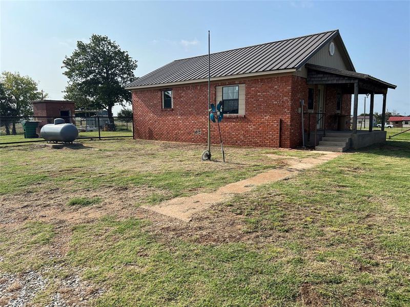 Exterior details and patio area of a home in , Nocona (Image 6).