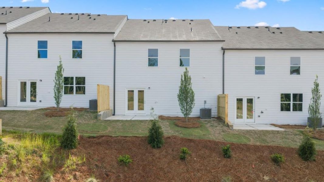 Exterior details and patio area of a home in Village at Pine Valley, Gainesville (Image 19).