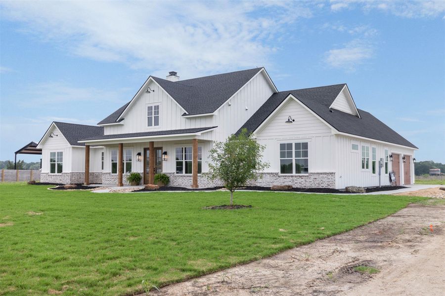 Front exterior of a new home in , Snook, TX, highlighting curb appeal (Image 27). Front exterior of a new home in , Snook, TX, highlighting curb appeal (Image 27).