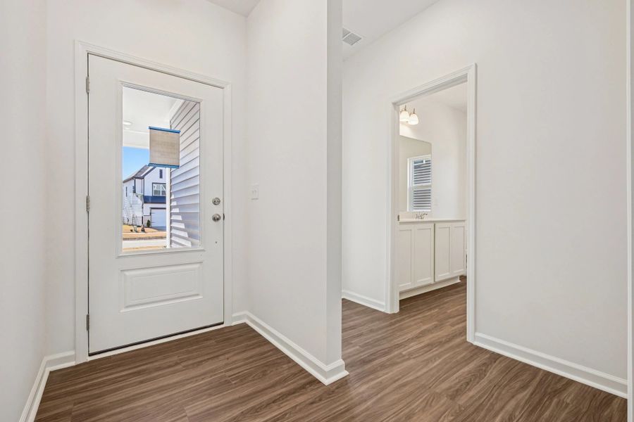 Foyer - An entry with sleek tones and flair.