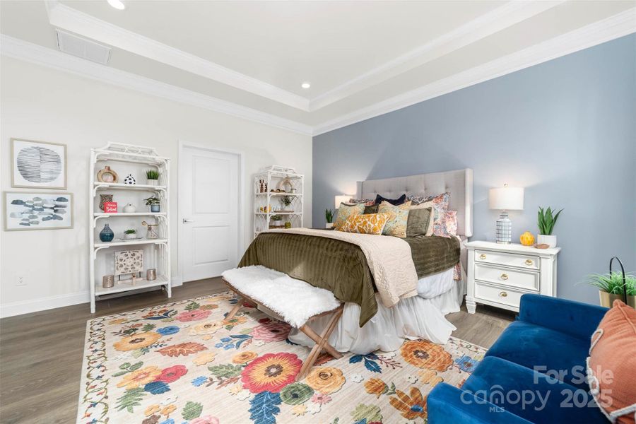 Primary bedroom with LVP