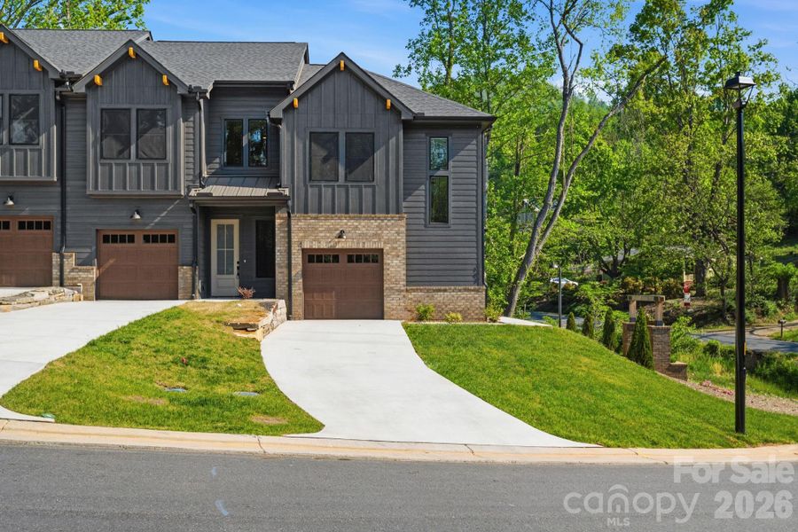 Front exterior of a new home in , Asheville, NC, highlighting curb appeal (Image 22).