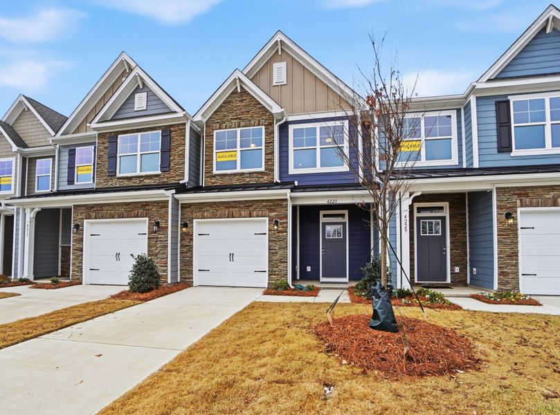 Front exterior of a new home in Harrisburg Village Townhomes, Harrisburg, NC, highlighting curb appeal (Image 29).