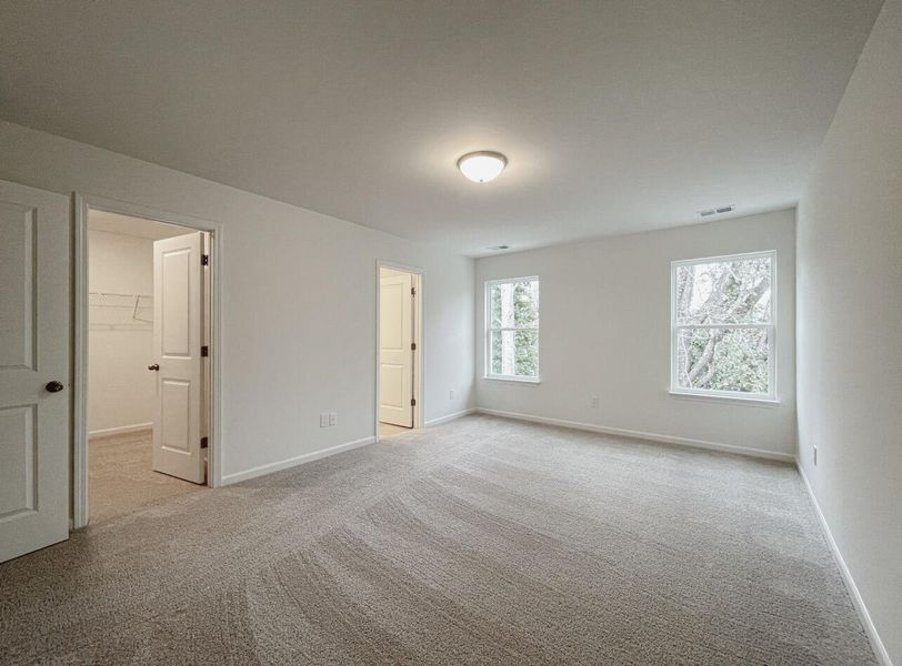 Spacious, unfurnished interior of a new home in East Main Townes, Spartanburg (Image 20).
