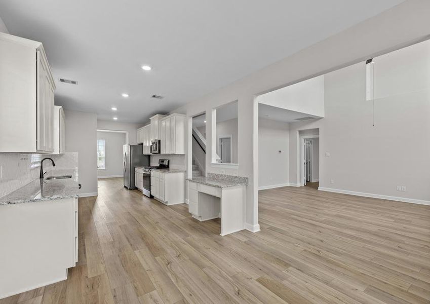 This home has an open concept layout with the kitchen open to the dining and family room.