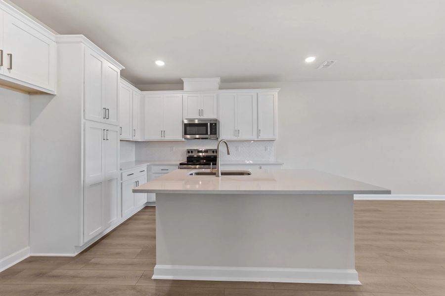 Furnished interior view inside a new home in Blue Heron Retreat, Little River (Image 7).