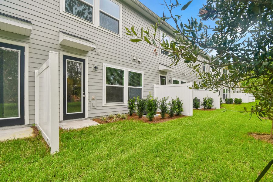 Exterior details and patio area of a home in Preserve at The Cays – The Harbor Series, Daytona Beach (Image 3).