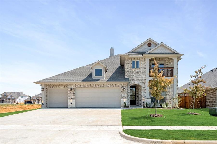 Front exterior of a new home in Mockingbird Hills 60-65, Joshua, TX, highlighting curb appeal (Image 25). Front exterior of a new home in Mockingbird Hills 60-65, Joshua, TX, highlighting curb appeal (Image 25).