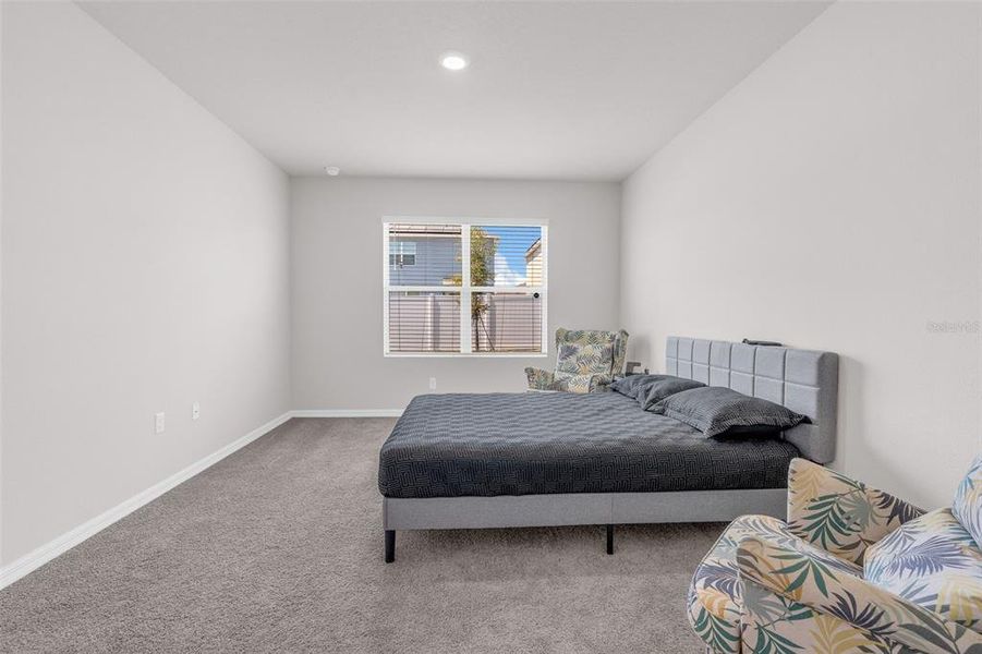 Furnished interior view inside a new home in Cypress Park Estates, Haines City (Image 28).