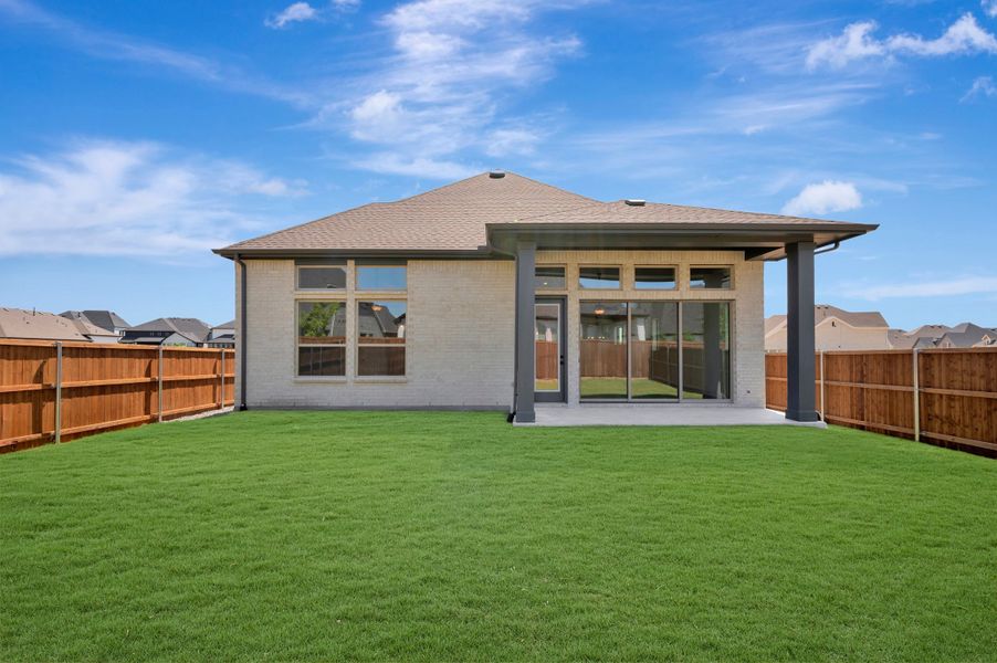 Exterior details and patio area of a home in Sandbrock Ranch, Aubrey (Image 3). Exterior details and patio area of a home in Sandbrock Ranch, Aubrey (Image 3).
