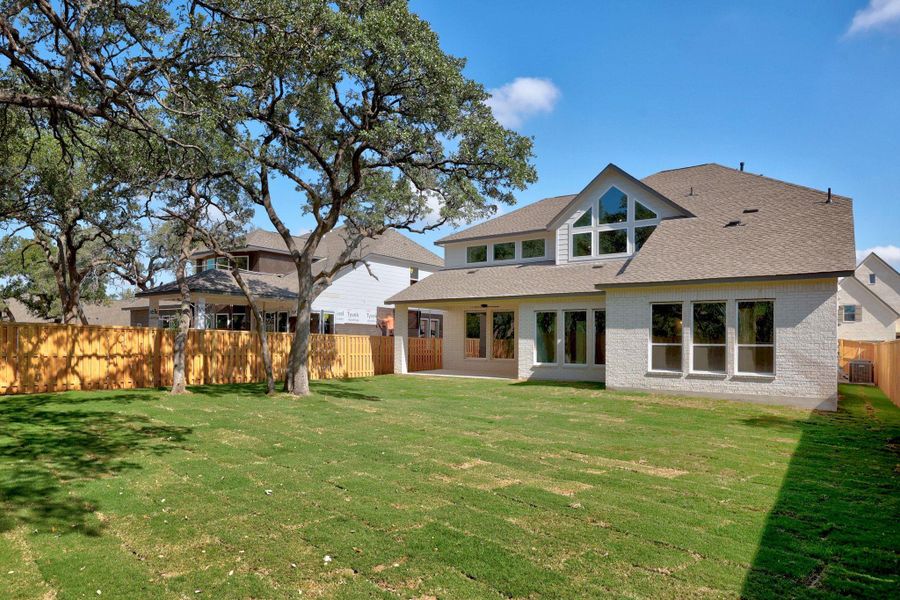 Exterior details and patio area of a home in Parmer Ranch - 60', Georgetown (Image 3).