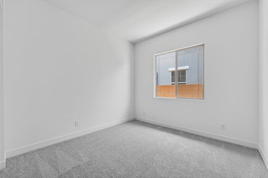 Spacious, unfurnished interior of a new home in Ellsworth Ranch, Queen Creek (Image 25).