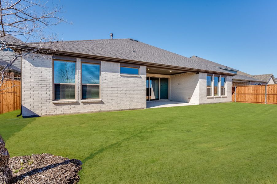 Representative exterior photo of a completed home built from the Jade by Taylor Morrison in South Oak 60s, Oak Point, TX (Image 2).