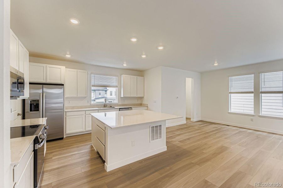 Furnished interior view inside a new home in Vermilion Creek: The Skyline Collection, Centennial (Image 6).