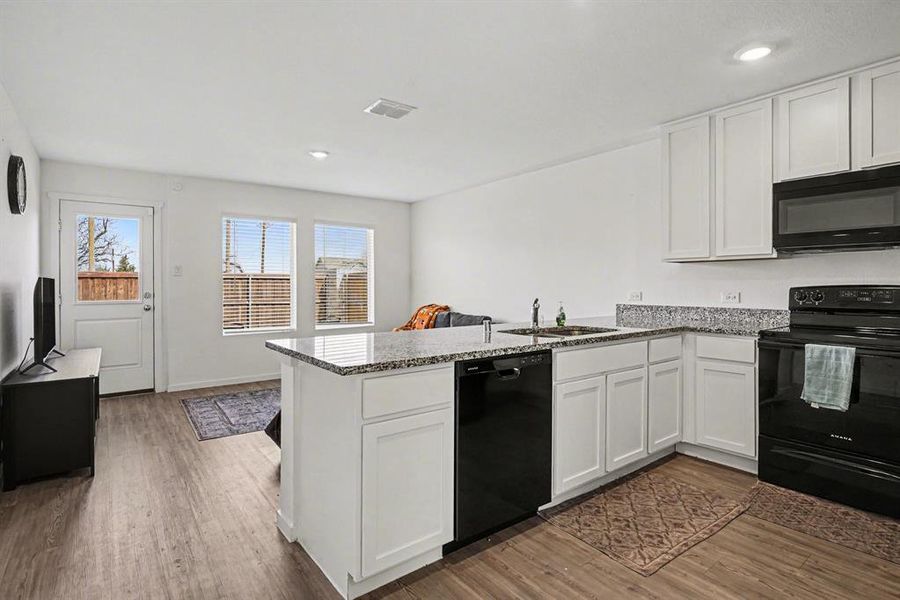 Furnished interior view inside a new home in Tillage Farms, Princeton (Image 6).