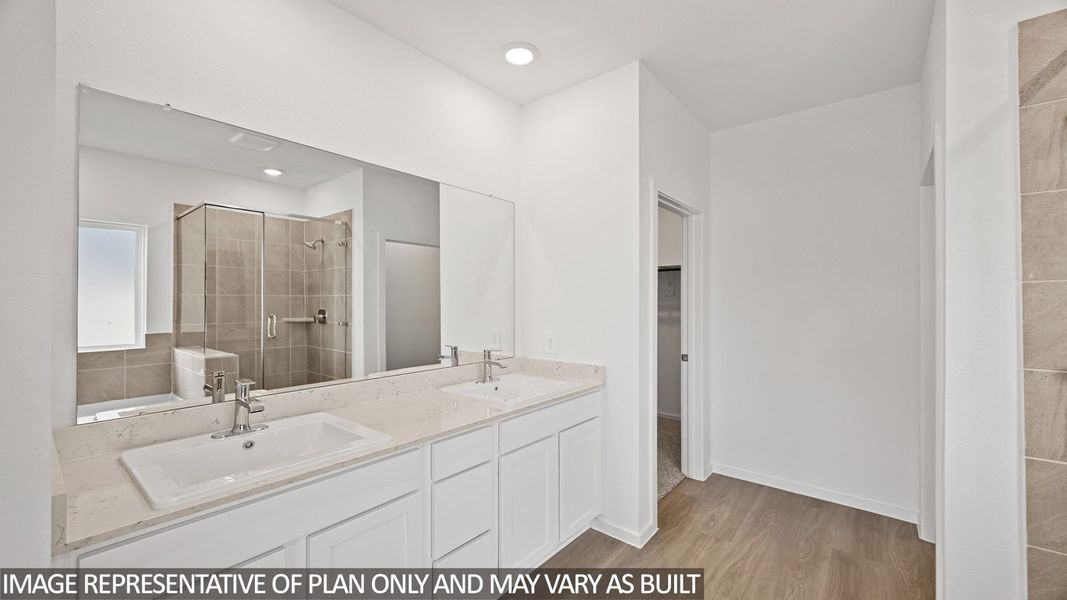 Furnished interior view inside a new home in Sunterra, Katy (Image 7).