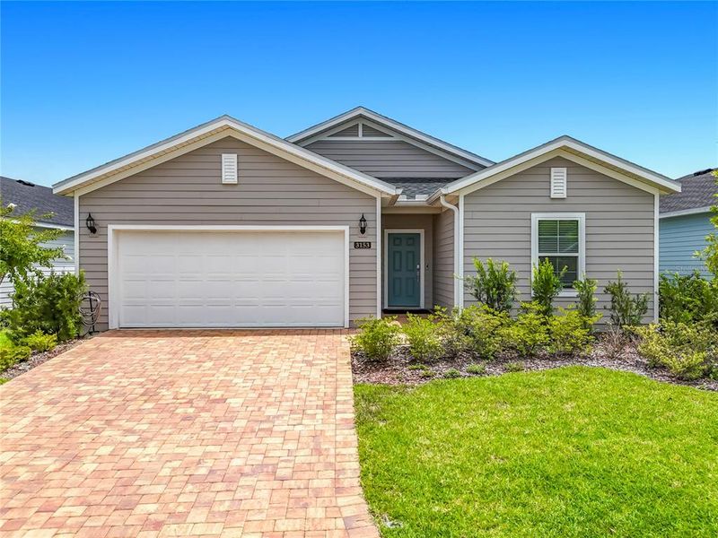 Front exterior of a new home in , Green Cove Springs, FL, highlighting curb appeal (Image 26). Front exterior of a new home in , Green Cove Springs, FL, highlighting curb appeal (Image 26).