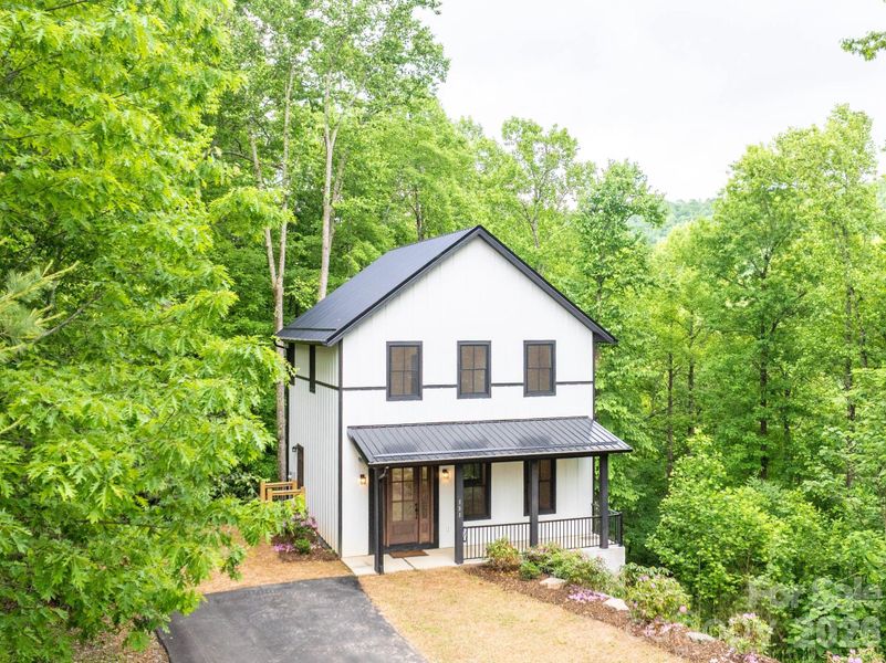 Front exterior of a new home in , Boone, NC, highlighting curb appeal (Image 22). Front exterior of a new home in , Boone, NC, highlighting curb appeal (Image 22).