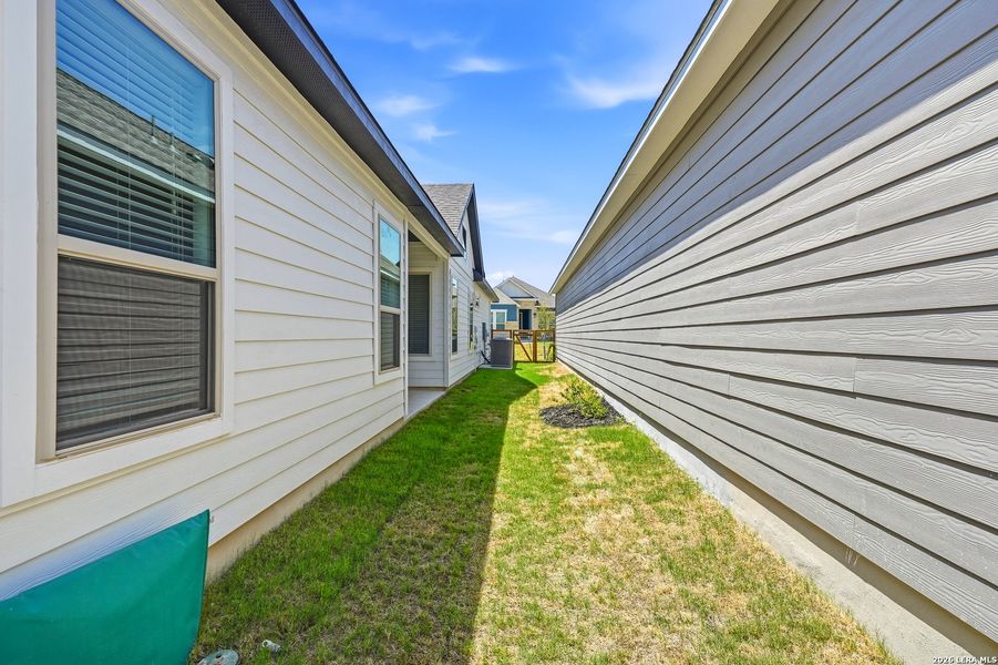 Exterior details and patio area of a home in The Crossvine, Schertz (Image 4).