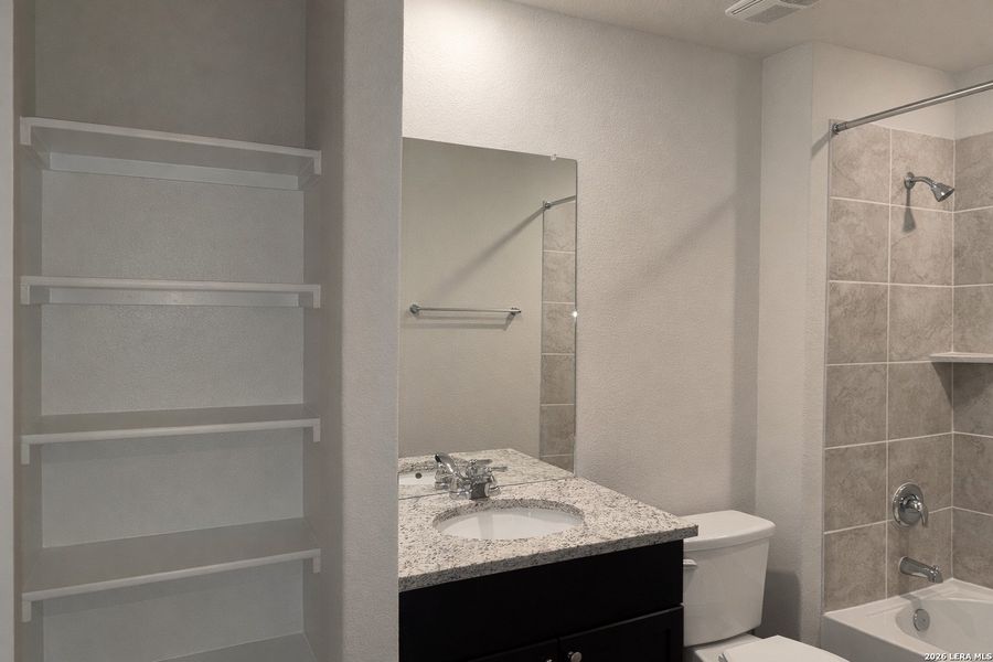 Furnished interior view inside a new home in Avenida, Converse (Image 6).