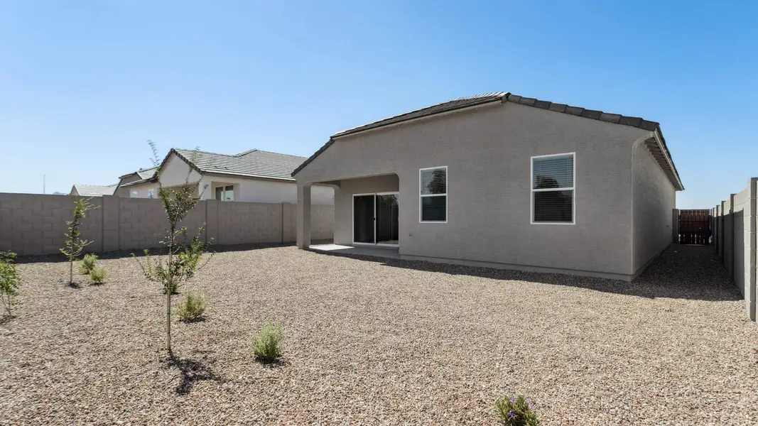 Exterior details and patio area of a home in Del Rio Ranch, Avondale (Image 3).