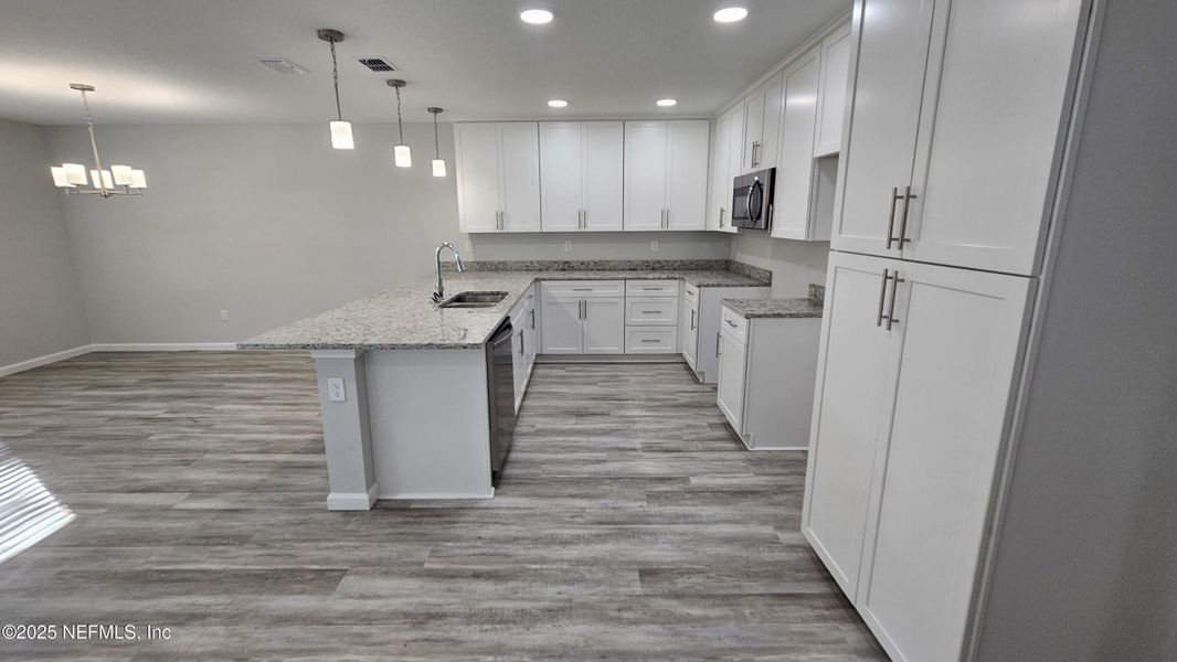 Furnished interior view inside a new home in , Jacksonville (Image 8). Furnished interior view inside a new home in , Jacksonville (Image 8).