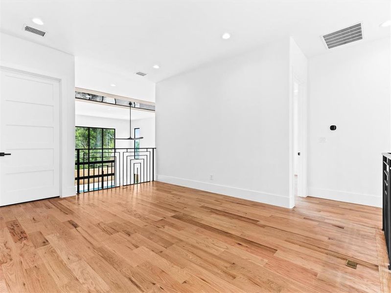 Unfurnished living room featuring light hardwood / wood-style floors