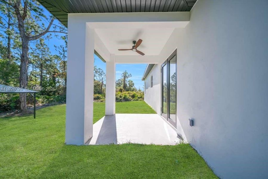 Exterior details and patio area of a home in , Lehigh Acres (Image 2). Exterior details and patio area of a home in , Lehigh Acres (Image 2).