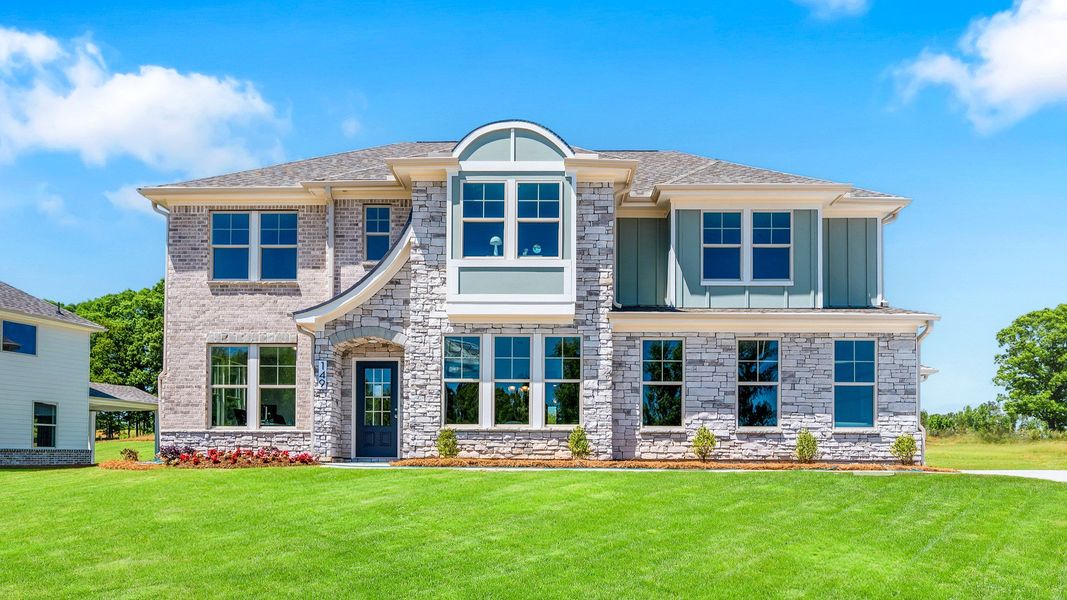 Representative exterior photo of a completed home built from the Stonefield by DRB Homes in Northcroft, Loganville, GA (Image 23).