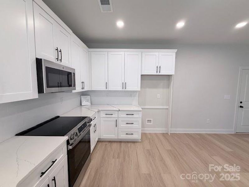 Furnished interior view inside a new home in , Gastonia (Image 12).