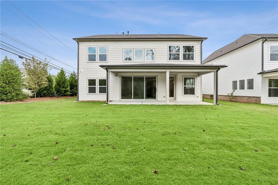 Exterior details and patio area of a home in Havencroft, Woodstock (Image 2).