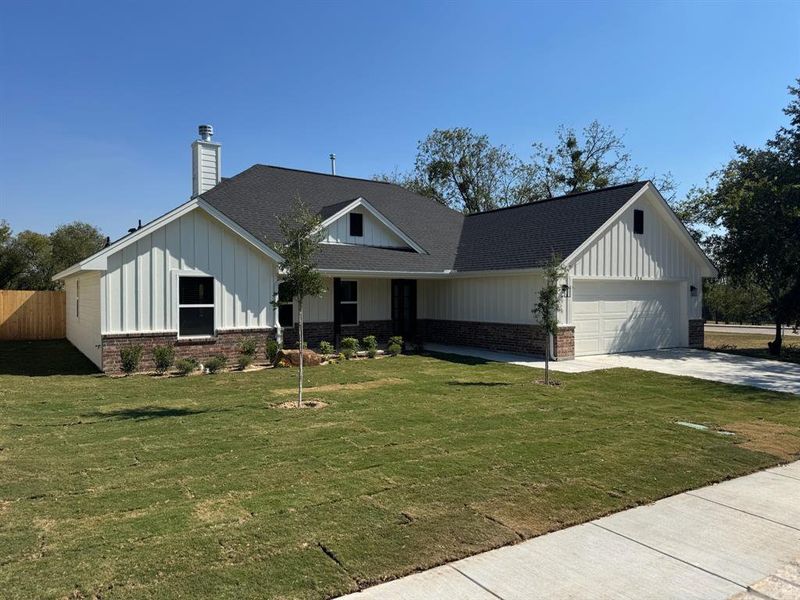 Front exterior of a new home in , Weatherford, TX, highlighting curb appeal (Image 2). Front exterior of a new home in , Weatherford, TX, highlighting curb appeal (Image 2).