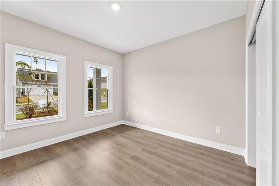 Spacious, unfurnished interior of a new home in The Courtyards at Bailey Farms, Dacula (Image 16).