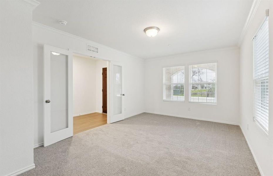 Flexible living space off entryway, can be used as a study