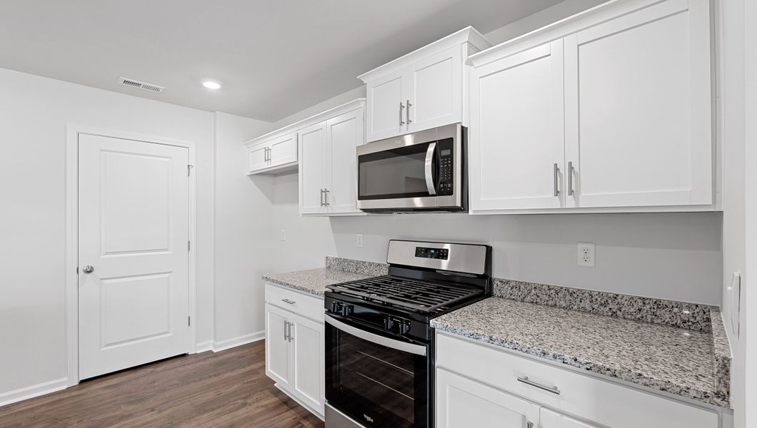 Furnished interior view inside a new home in Sherwood Gardens, Landrum (Image 6).