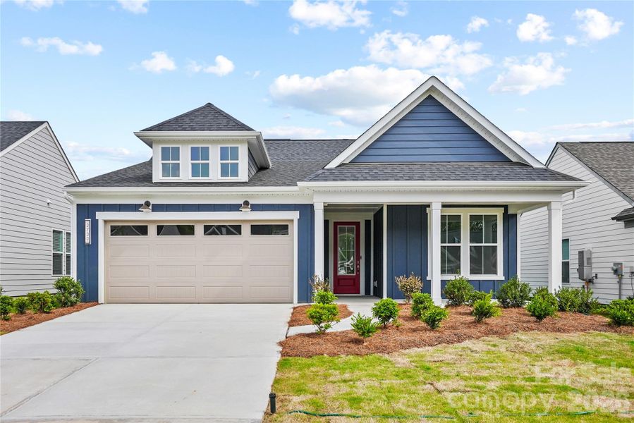 Front exterior of a new home in Carolina Riverside, Belmont, NC, highlighting curb appeal (Image 2). Front exterior of a new home in Carolina Riverside, Belmont, NC, highlighting curb appeal (Image 2).