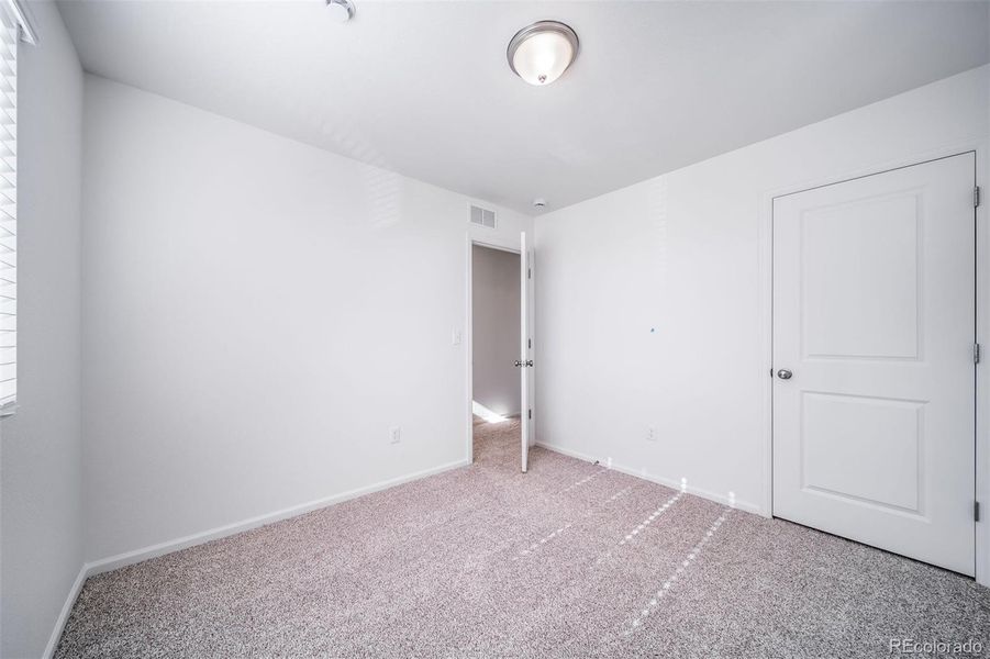 Spacious, unfurnished interior of a new home in Muegge Farms, Bennett (Image 25).