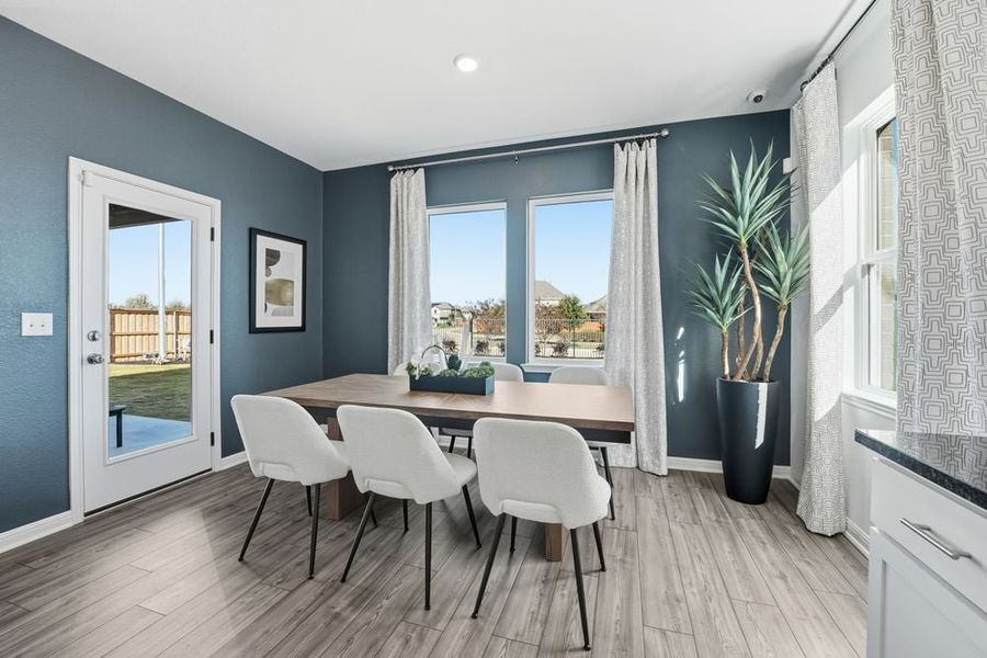 Representative furnished interior of a home built from the Harrier by Taylor Morrison in Longview 40s, Del Valle (Image 6).