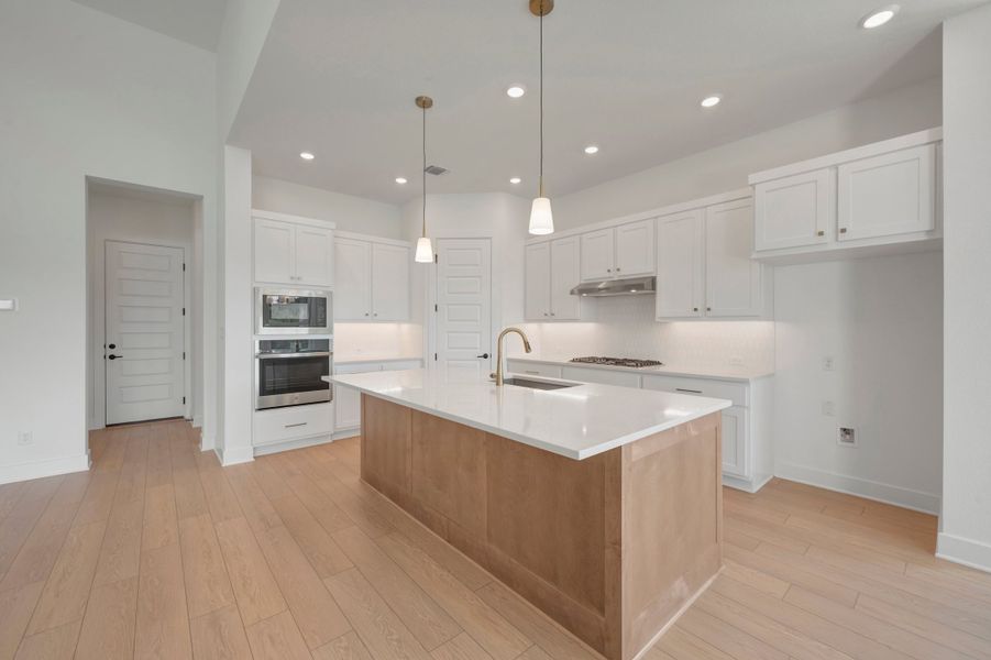 Furnished interior view inside a new home in Headwaters 50' - Executive Series, Dripping Springs (Image 7).