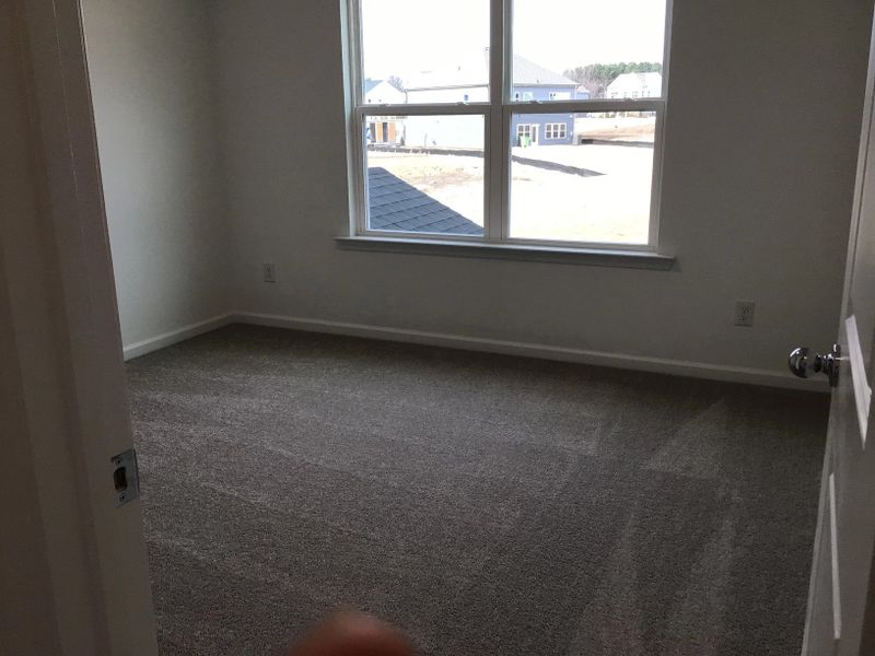 Bed 3 featuring the AW Collection® Coastal - Light-filled and calm, ideal for guests or family.