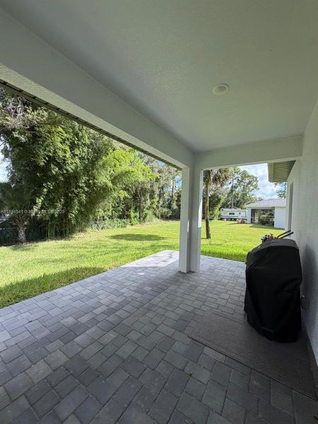 Exterior details and patio area of a home in , Lehigh Acres (Image 10). Exterior details and patio area of a home in , Lehigh Acres (Image 10).