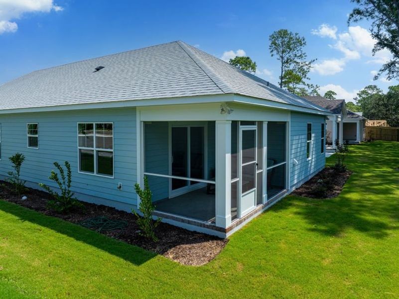 Front exterior of a new home in Osprey Landing, Southport, NC, highlighting curb appeal (Image 28).
