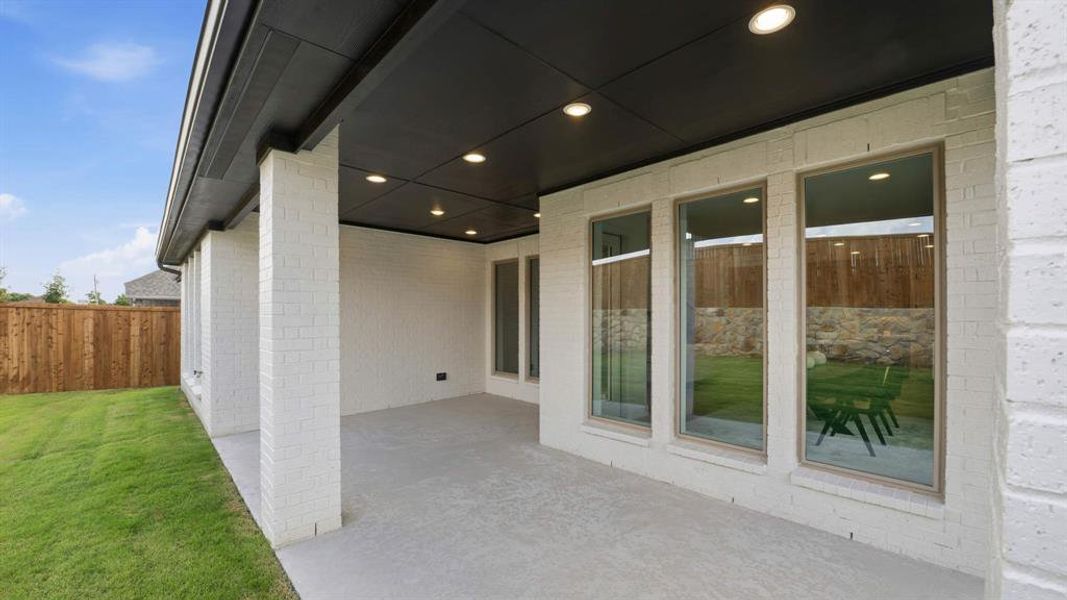 Exterior details and patio area of a home in The Heights at Uptown Celina, Celina (Image 2).