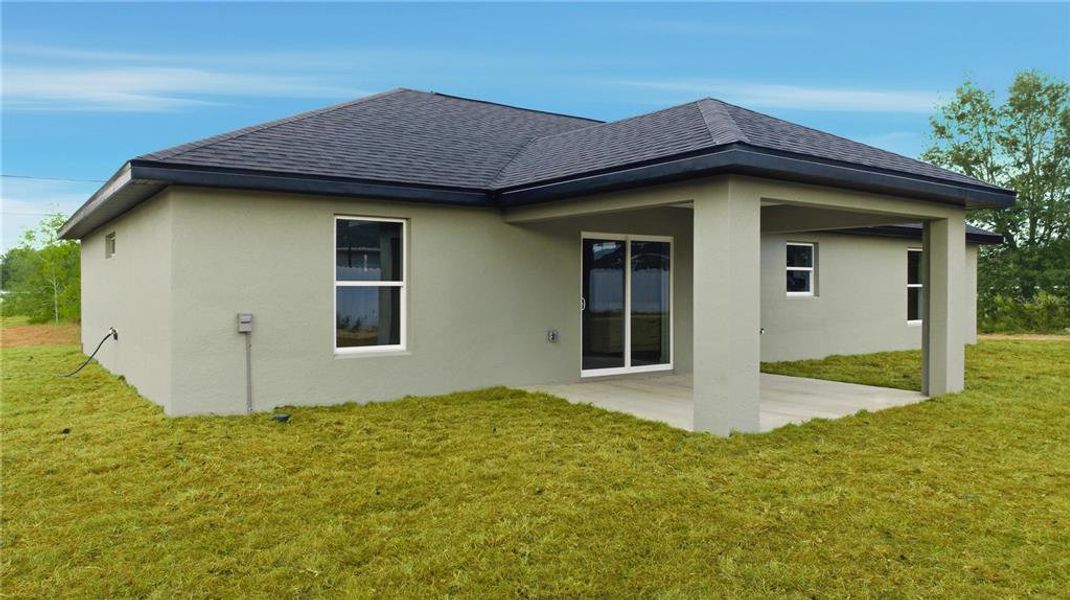 Exterior details and patio area of a home in , Ocala (Image 3).